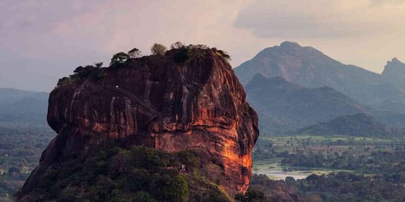 From Colombo: Sigiriya and Dambulla Full-Day Private Tour - Dambulla Cave Temple: walking into centuries of Buddha art