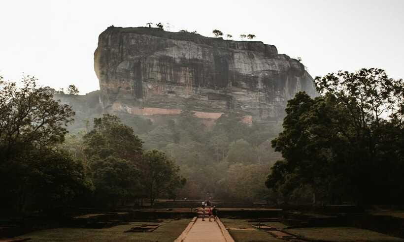 From Colombo: Sigiriya Rock Sunrise Climb with Dambulla … - Dambulla Cave Temple and Golden Temple: paintings, statues, and the right clothing