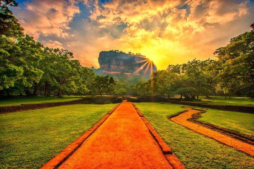 From Colombo: Sigiriya Rock Sunrise Climb with Dambulla … - Sigiriya Lion Rock in the dark: torchlight, stairs, and the summit moment