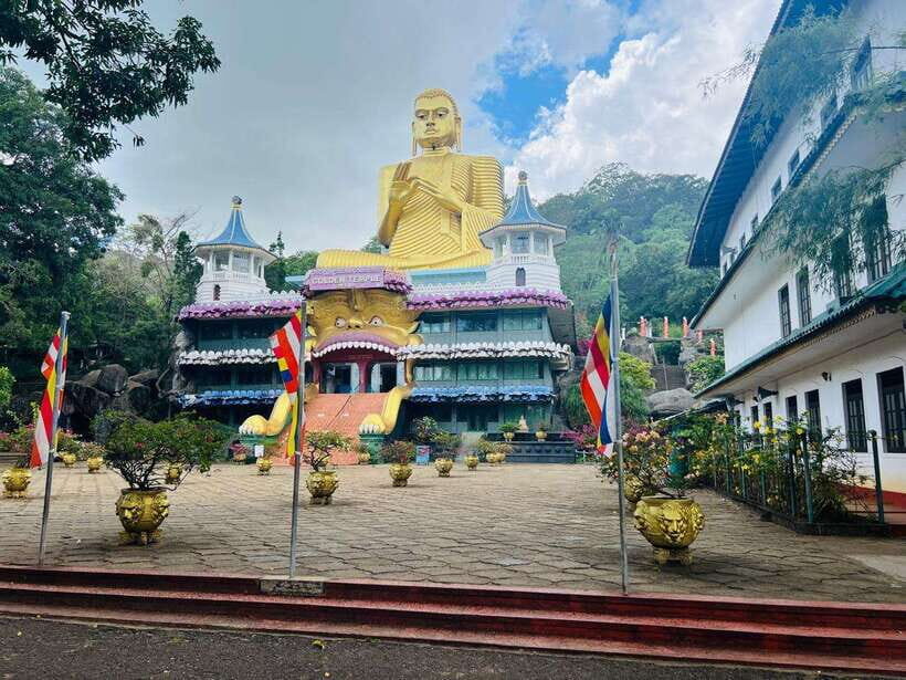 From Kandy: Sigiriya Day Tour with Elephant Safari(group) - Dambulla Cave Temple: Buddha statues and murals in a focused hour