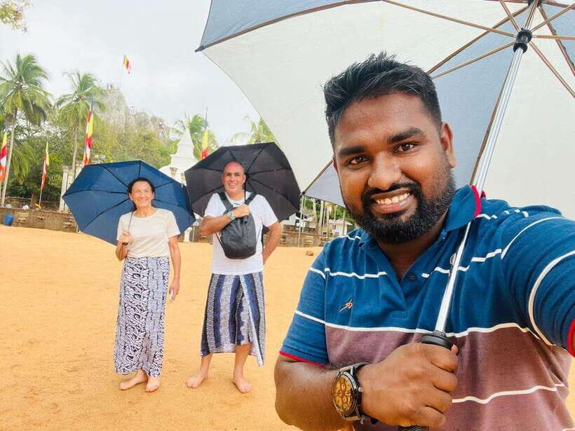 From Sigiriya: Kandy Drop and City Tour with Key Stops - Dambulla Cave Temple and Golden Temple: murals, Buddha statues, and stairs
