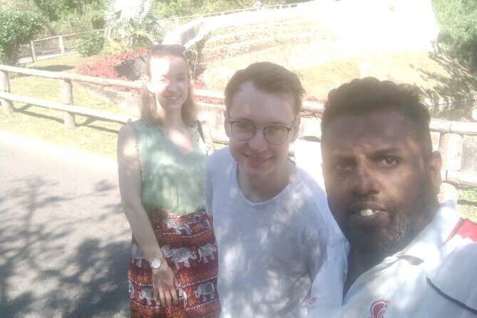 Kandy City Tour with Tuk-Tuk Private Experience - War Cemetery and Suspension Bridge: quiet reminders plus a scenic break