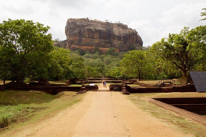 Private Day Tour from Kandy to Sigiriya and Dambulla Cave temple - Sigiriya Ancient Rock Fortress: Watching the Fortress Take Over the Sky