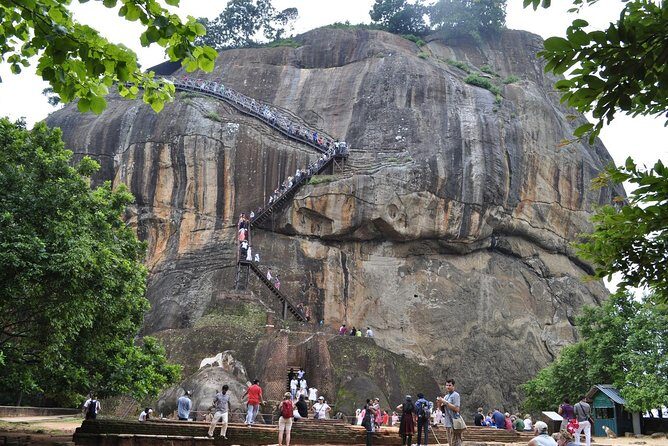 Sigiriya & Dambulla Private Day Trip with Entry Fees & Lunch - Stop 1: Sigiriya Lion Rock Fortress climb and the payoff