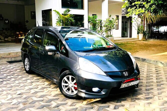 Sri Lanka Private Transfer from Colombo Airport to Anywhere - Inside the Vehicle: A/C Comfort, Bottled Water, and Wi-Fi